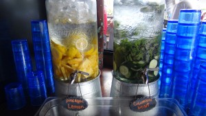 Drinking water infused with pineapple/lemon and cucumber/mint at Nalu's South Shore Grill. Photo by Kiaora Bohlool.