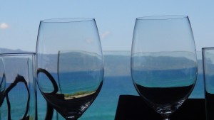 Wine glasses overlooking the ocean view at Merriman's Kapalua.  Photo by Kiaora Bohlool.