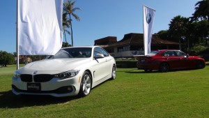 Cars showcased at Kāʻanapali Golf Course for the BMW Golf Challenge. Photo by Kiaora Bohlool.