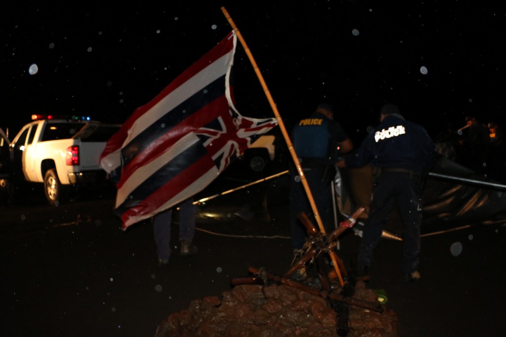 DOCARE officers disassembed, loaded and took as evidence, a large tent that protesters had erected at the 9000 foot elevation level, across the road from the Mauna Kea Visitors Center. Photo credit: DLNR.