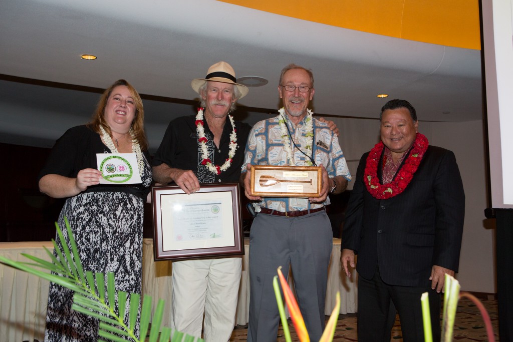 Mayor Arakawa and Pamela Tumpap pose with winners of the 2014 Lifetime Achievement Award, Jim (right) and Rand Coon. File photo credit: County of Maui.