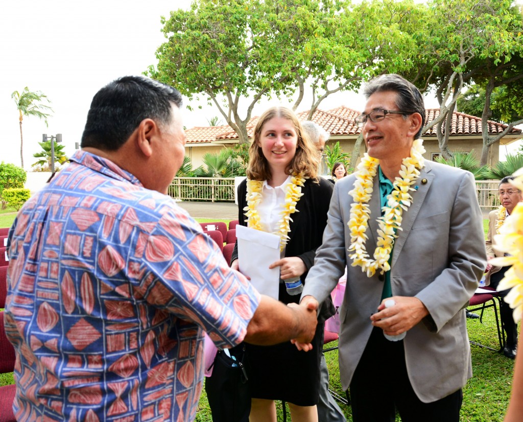 Mayor Alan Arakawa welcomes Fukuyama City Mayor Akira Hada to the County Building on a past visit as Japanese language translator Kathy Rice looks on. Photo credit: Ryan Piros/County of Maui.