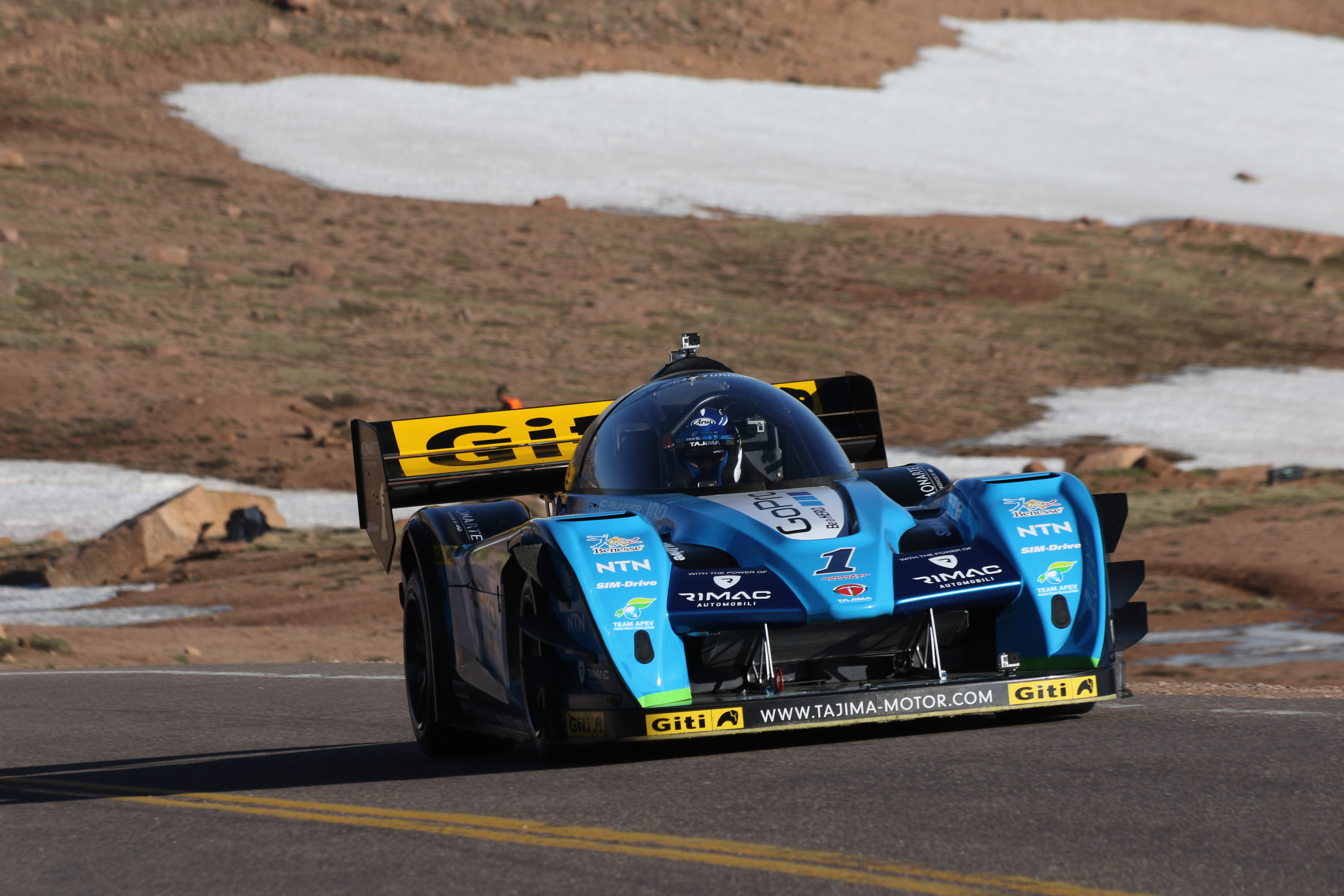 Nobuhiro “Monster” Tajima, shown here racing the Pike’s Peak Hillclimb in his custom-built, $5 million electric race car, will appear in the Maui Fair Parade and greet the public at the County Tent at the fair. Photo courtesy TEAM APEV.
