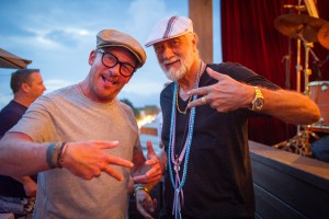 Mick Fleetwood and friend enjoy the rooftop lanai at Fleetwood's on Front Street. Photo by: ©AndrewStuart.com