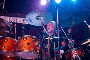 Mick Fleetwood keeps rocking on the drums, despite a downpour at Fleetwood's on Front Street. Photo by: ©AndrewStuart.com