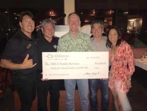 Dean Wong (Imua Family Services), Alan Wong (Alan Wong’s Restaurants), Bob Harrison (First Hawaiian Bank), Roy Yamaguchi (Roy’s Restaurants of Hawaii) and Denise Hayashi Yamaguchi (Hawaii Food and Wine Festival) pose with the donation check for Imua Family Services.  Courtesy photo.