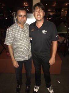 Chief Executive Officer of SSCP Management, Sunil Dharod with Imua Family Services Executive Director Dean Wong, after Dharod matched the tournament's $45K, bringing the night’s donation total to $90K.