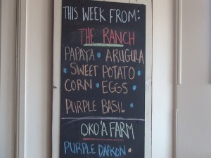 The evolving list of farm-fresh produce at Hāna Ranch Provisions in Pāʻia. Photo by Kiaora Bohlool.