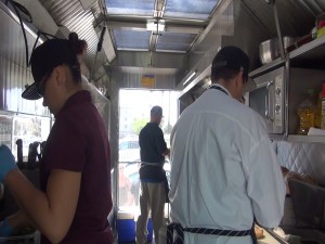 Chefs working in the food truck kitchen at Maui Fresh Streatery. Photo by Kiaora Bohlool.