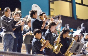 King Kekaulike High School band plays for the home team as the players run out of the locker room to start the second half. Photo by Rodney S. Yap.