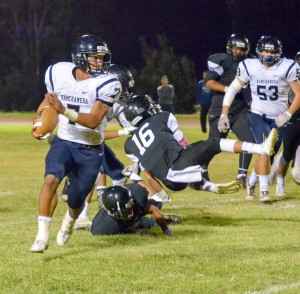 Kamehameha Maui running back Ikaika Chong Kee led all rushers Saturday with 70 yards. Photo by Rodney S. Yap.