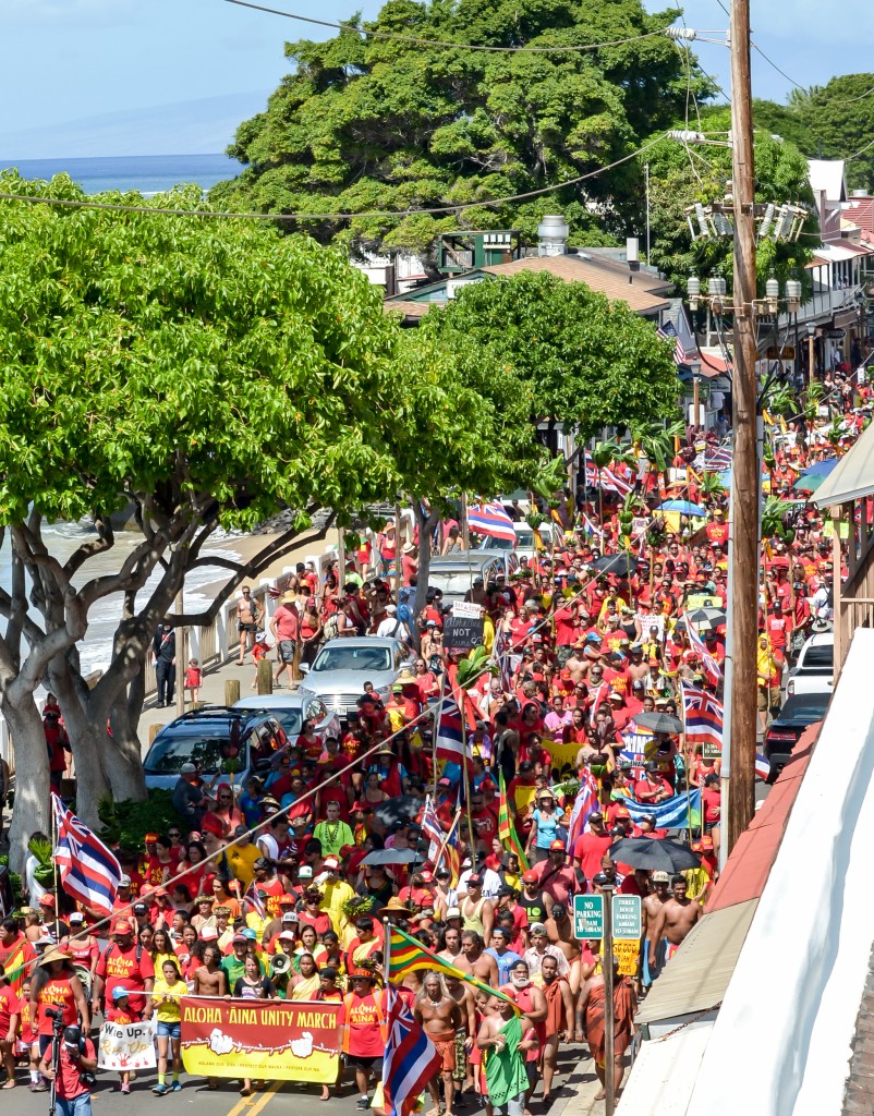 The color red was prominent at Sunday's Aloha ʻĀina Unity March down Front Street in Lahaina, where organizers estimate 6,000 people attended the march and the rally that followed. Photo by Rodney S. Yap.