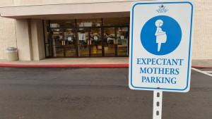 Expectant mothers parking sign at the back entrance to the Women's Macy's department store in Kahului. Photo by Wendy Osher.