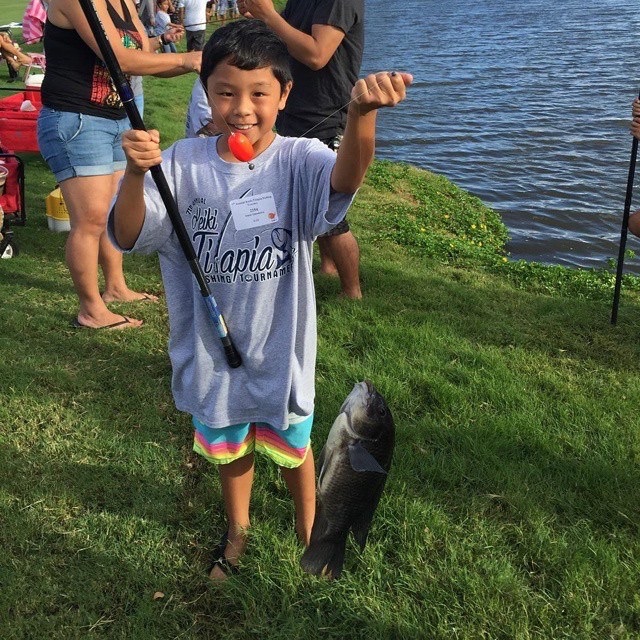 Isaac Imamura won the “Tilapa-Whoppa” award for catching the largest tilapia – 998 grams – during this year’s 7th Annual Keiki Tilapia Fishing Tournament 2015 hosted by Maui Electric and Kā‘anapali Golf Course.