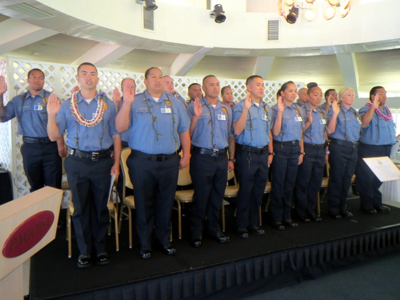Adult Corrections Officer Recruit Graduation Class taking their oath. Photo credit: Department of Public Safety.