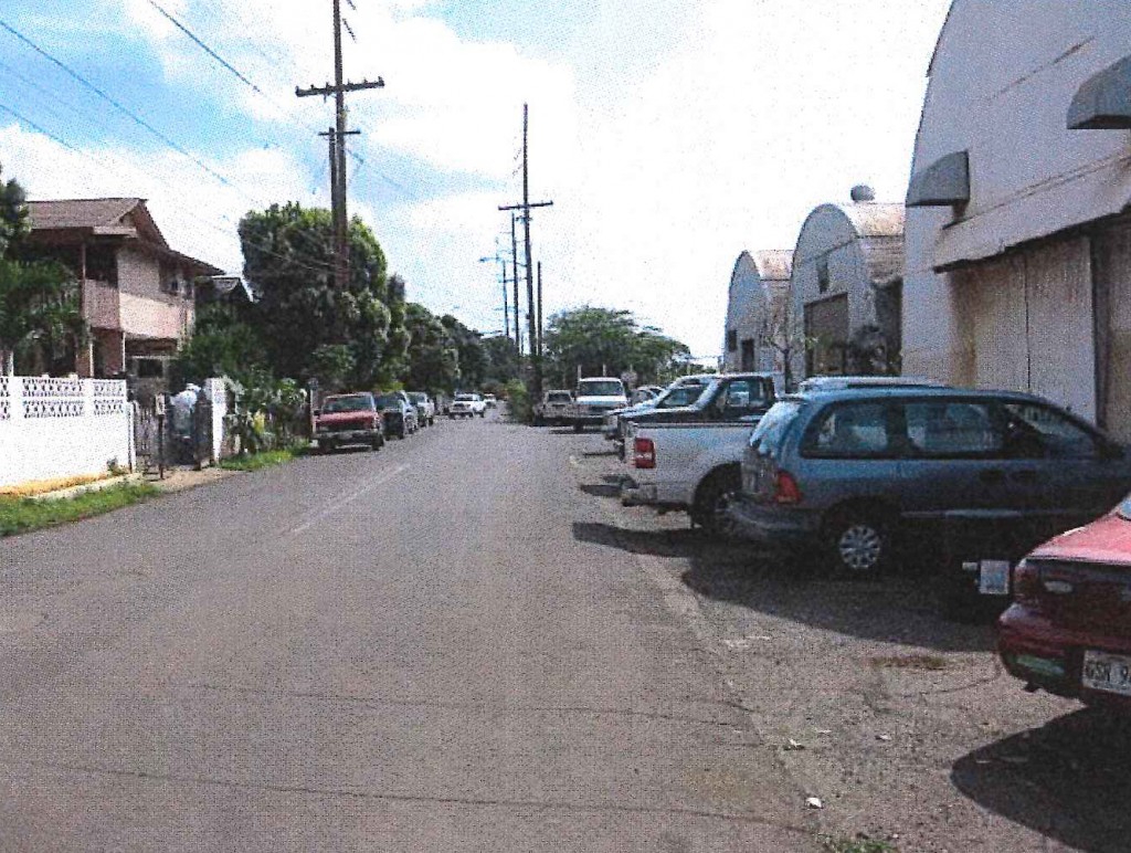 View south near Keone Street on Kuhua Street toward Lahainaluna Road Intersection. Old Kuhua Tract subdivision on left and Pioneer Mill site quonset huts on right. Photo credit: Munekiyo Hiraga via Final Environmental Assessment prepared for the Maui Department of Public Works.