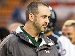 Nick Rolovich played (2000-01) and coached (2003-04 and 2008-11) at UH, where he still holds several passing records, including most touchdowns in a quarter and a game. AP file photo by Eugene Tanner.