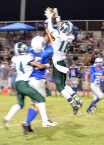 Molokai's William Dela Cruz (16) breaks up this pass intended for a Seabury receiver. Photo by Rodney S. Yap.