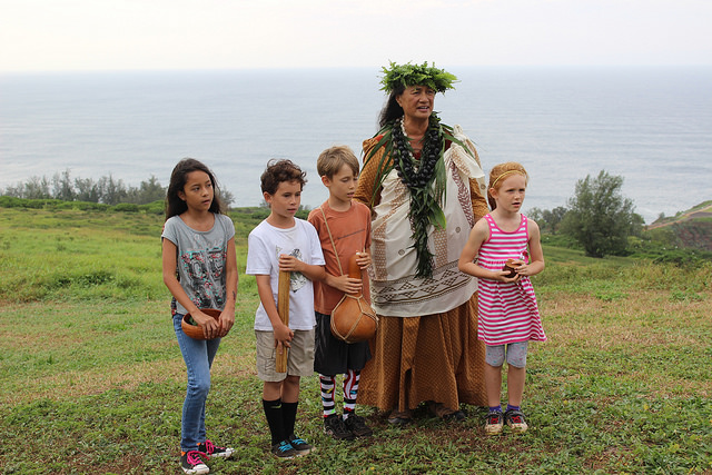 Island School children and Kumu Sabra Kauka Sing 'Oli. Photo credit: Ann Bell/USFWS