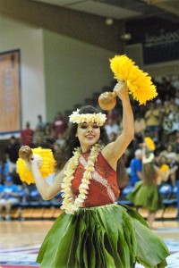 A Maui hula dancer performs during a break in the action Tuesday at the Maui Invitational Tournament. Photo by Joel B. Tamayo.