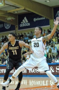Wake Forest's John Collins works the low post against Vanderbilt's Jeff Roberson Tuesday at the Lahaina Civic Center. Photo By Joel B. Tamayo.