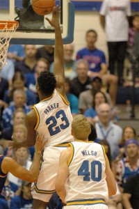UCLA's Tony Parker goes up for a basket Tuesday against Kansas. Teammate Thomas Welsh (40) looks on. Photo by Joel B. Tamayo.