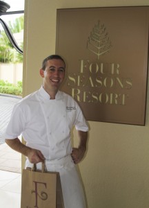 Executive Sous Chef Marco Calenzo, getting ready to hand over a "Turnkey Turkey" package. Photo courtesy of Four Seasons Resort Maui.