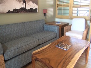 Couch and table in an ocean bungalow at Travaasa Hana. Photo by Kiaora Bohlool.