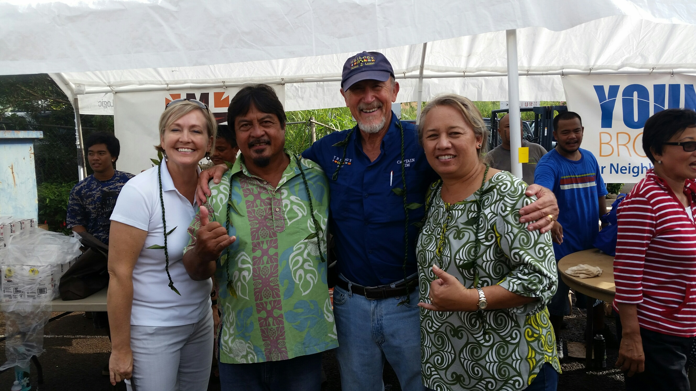 Lāna‘i Rice Giveaway: (left to right) Lisa Paulson, Maui Hotel & Lodging Association; Albert Ranis Jr., Young Brothers; Jim Coon, Trilogy; Lynn DeCoite, Hawai‘i State Representative.