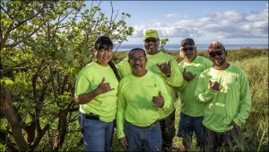 Members of Monsanto Molokaʻi’s conservation team (pictured left to right): Kali Arce, Patrick Kansana, Chad Tangonan (behind Pat), Kenneth Kaai, Freddie Manaigo.
