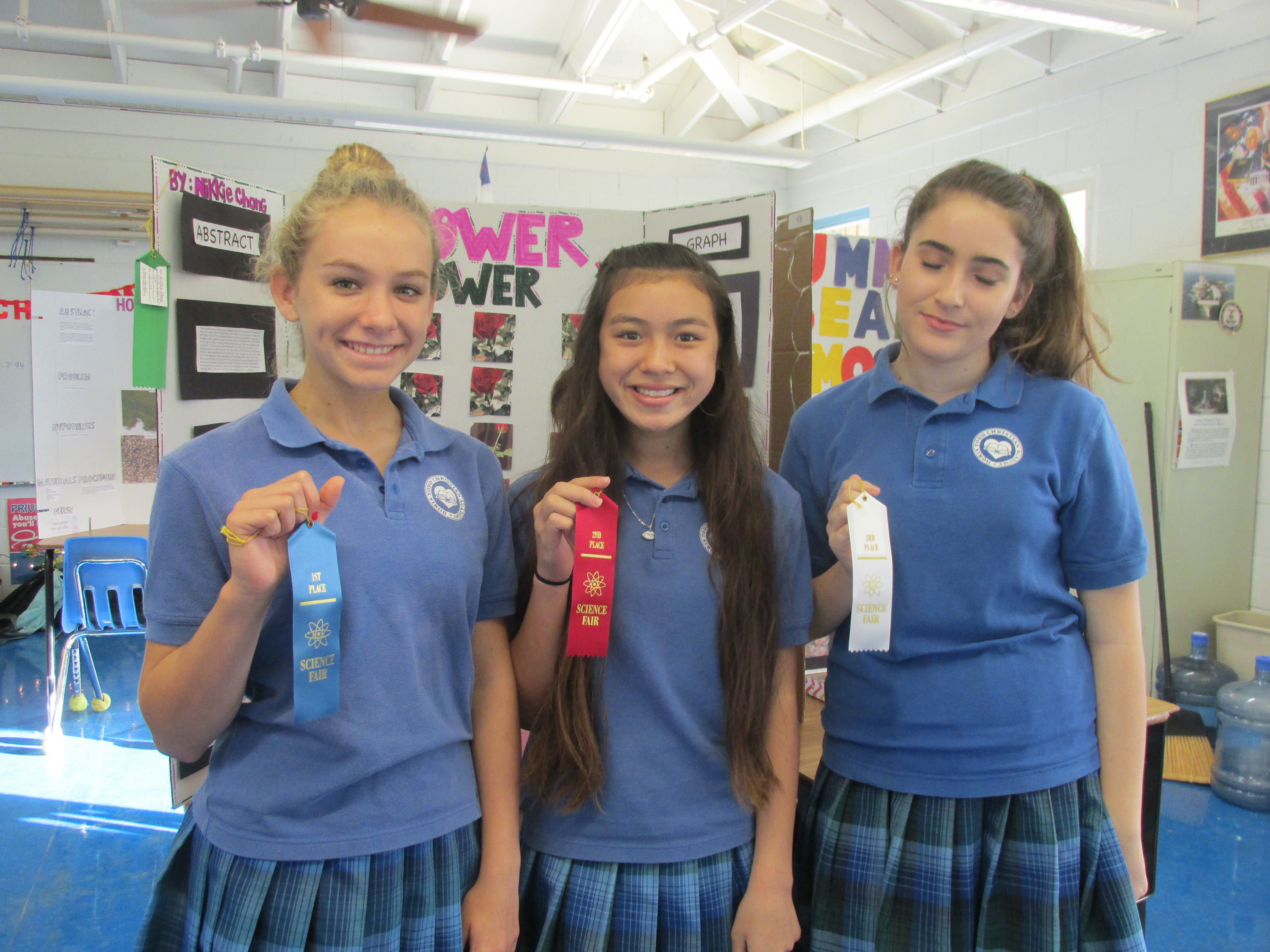 Dorris Todd Science Fair eighth grade winners (left to right) Kaya Dugan, first place; Nikkie Chong, second place; and Laura Rowland third place.