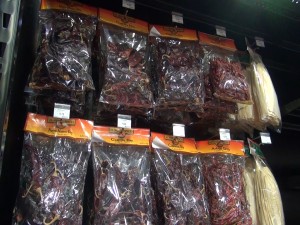 An assortment of dried chili peppers on the shelves at Island Grocery Depot in Lahaina. Photo by Kiaora Bohlool.