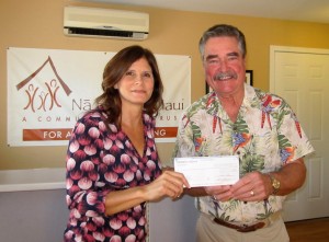 HomeStreet Bank Loan Officer Lisa Carillo presents a check for $5,000 to Na Hale O Maui Executive Director John Andersen to support the Community Land Trust’s Homebuyers’ Assistance Program. 