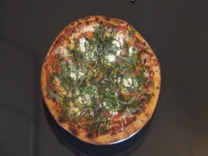 Margherita Pizza with fresh basil. Photo by Kiaora Bohlool.