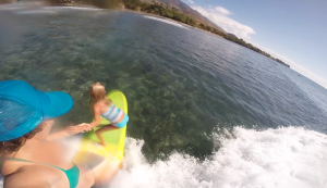 Surfer Girl tandems with professional big wave surfer, Paige Alms