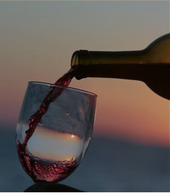 Wine at sunset. Photo courtesy of Kai Kanani Sailing Charters.