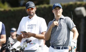 PGA golfer Jordan Spieth waits with his caddie Mike Greller before teeing off on the first hole during the second round of the Hyundai Tournament of Champions golf tournament at Kapalua Resort on Friday. Photo by Brian Spurlock of USA TODAY Sports.