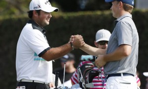 PGA golfer Patrick Reed shakes hands on the first tee with Jordan Spieth during the second round of the Hyundai Tournament of Champions golf tournament at The Plantation Course. on Friday. Photo by Brian Spurlock of USA TODAY Sports.
