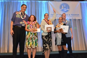 (Left to right) Mufi Hannemann, HLTA President & CEO; Heidi Michel-Bunyard, second place winner in the Outstanding Lodging Employee of the Year category; Emily Arcangel, first place winner for Outstanding Lodging Employee of the Year; Celena Burkhart, third place winner for Outstanding Lodging Employee of the Year; and Ben Rafter, HLTA chairperson. Photo courtesy HLTA. 