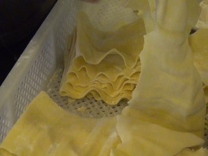 Lasagna coming out of the pasta maker at Maui Pasta Company. Photo by Kiaora Bohlool.