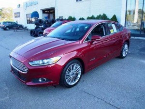 Stolen: Jan. 31, 2016 from a home in Pāʻia. 2013 RED Ford Fusion HYBRID. Other identifying characteristics: *long scrape across the passenger side; *shell necklace hanging from review mirror. License: (Hawaii plates) LDR 823. Police Report: 16-004451.