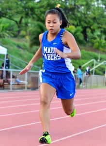Maui High girls sprinter in the 100-meter dash. Photo by Rodney S. Yap.