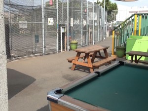 Pool table and batting cages at Hitter's Paradise. Photo by Kiaora Bohlool.