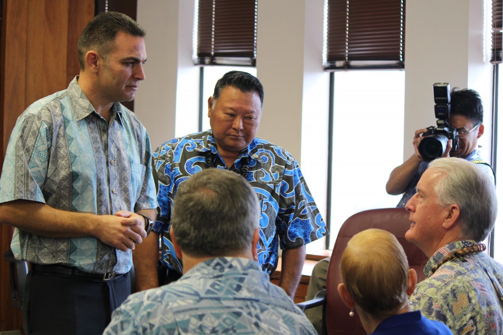 Budget Director Sandy Baz (left) and Maui Mayor Alan Arakawa (right) speak with council members Don Couch, Gladys Baisa and Mike White as they present the Mayor's version of the 2017 Fiscal Year budget to the council. Photo (3.24.16) by Wendy Osher.