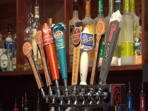 Beers on tap at Three's Bar & Grill. Photo by Kiaora Bohlool.