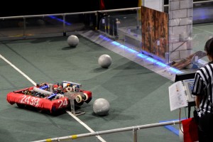 Baldwin High’s robot, #2439, moves to pick up a ball from the competition field during a qualification match at the 2016 Hawaii FIRST Regional Competition.