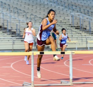 Baldwin's Kacy-Lyn Navarro won four events last week and the Kamakea Meet. She was named the meet's top female field performer for his wins in the long jump and triple jump. But she also won the girls 100 and 300 hurdles. Photo by Rodney S. Yap.