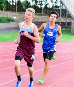 Baldwin's Kai Sears won the boys 1500. Maui High's Dylan Vega finished third in the race, behind runner-up Eden Mackinnon. Photo by Rodney S. Yap.