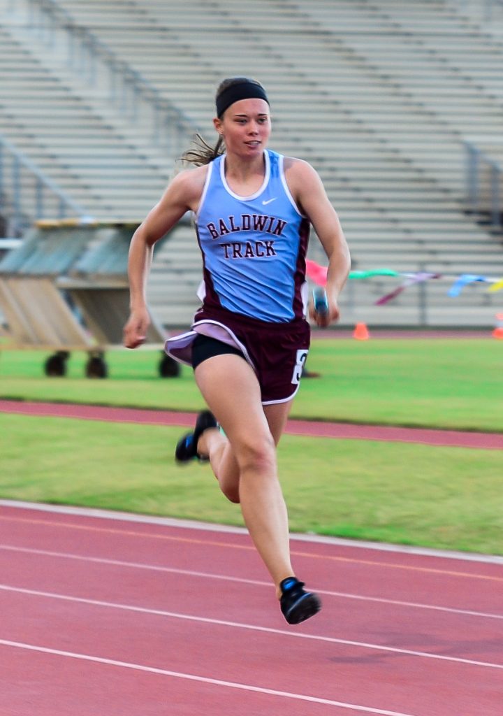 Baldwin's versatile Kaitlin Smith figures to be the Lady Bears' top scorer at this weekend's MIL track championships. Photo by Rodney S. Yap.