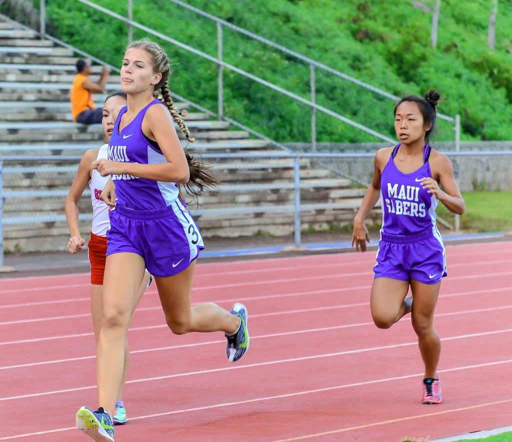 Maui High's Emily Craig and teammate Jules Giron finished second and fourth, respectively, in the girls 1500-meter run Saturday. Photo by Rodney S. Yap.